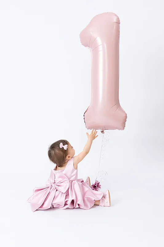 Smash cake birthday session photographed by Darina Photography in Barnet, North London